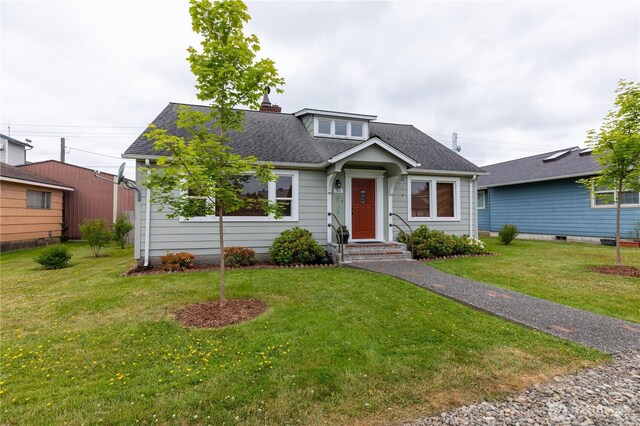 50 Blackberry St, Forks, WA 98331 - bungalow-style home featuring roof with shingles, a front lawn, and a chimney