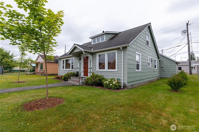 50 Blackberry St, Forks, WA 98331 - bungalow-style home featuring a front lawn and roof with shingles