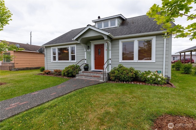 50 Blackberry St, Forks, WA 98331 - bungalow-style home featuring a front yard and roof with shingles
