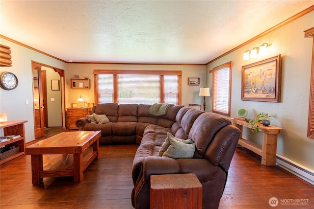 50 Blackberry St, Forks, WA 98331 - living area with wood-type flooring, crown molding, and baseboard heating