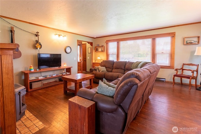 50 Blackberry St, Forks, WA 98331 - living room featuring hardwood / wood-style floors, crown molding, a textured ceiling, and baseboard heating