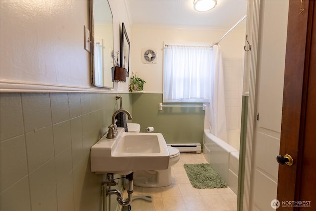 50 Blackberry St, Forks, WA 98331 - full bath with a baseboard radiator, shower / bathtub combination with curtain, and crown molding