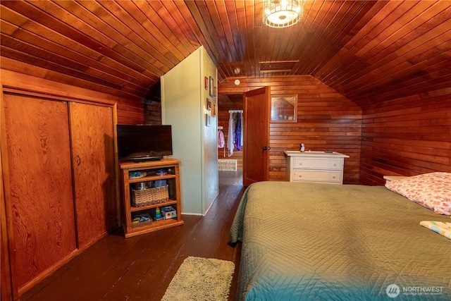 50 Blackberry St, Forks, WA 98331 - bedroom with vaulted ceiling, wood walls, wood ceiling, hardwood / wood-style floors, and a closet