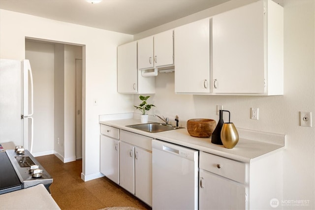 7001 Sand Point Way NE Unit B410, Seattle, WA 98115 - kitchen featuring white appliances, light countertops, and white cabinets