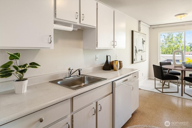 7001 Sand Point Way NE Unit B410, Seattle, WA 98115 - kitchen with dishwasher, light countertops, and white cabinetry