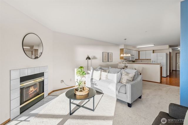 8026 Birch Bay Dr Unit 216, Blaine, WA 98230 - living area with a tiled fireplace and light carpet