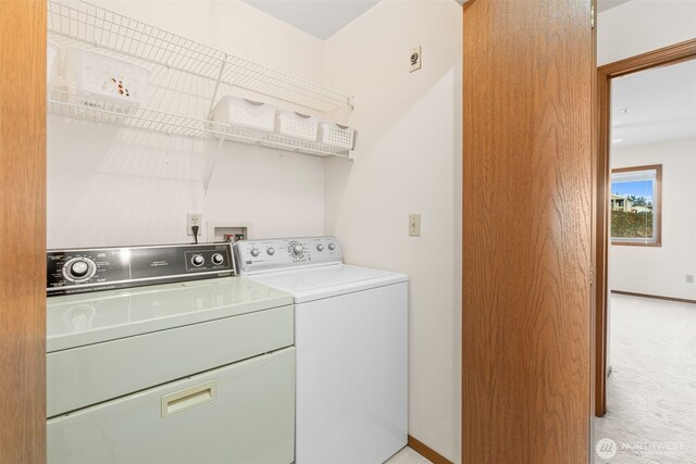 8026 Birch Bay Dr Unit 216, Blaine, WA 98230 - washroom featuring washer and clothes dryer and light carpet