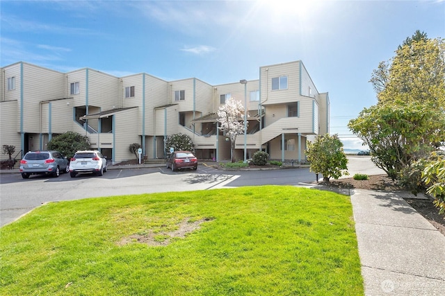 8026 Birch Bay Dr Unit 216, Blaine, WA 98230 - view of property featuring uncovered parking and a residential view