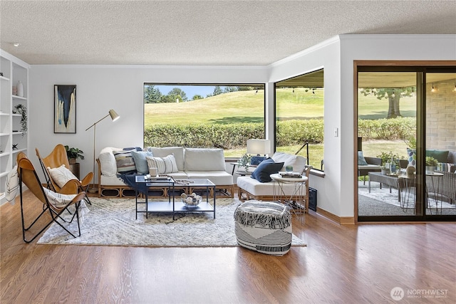 10742 Glen Acres Dr S Unit T-27, Seattle, WA 98168 - living room featuring wood finished floors, a textured ceiling, and crown molding