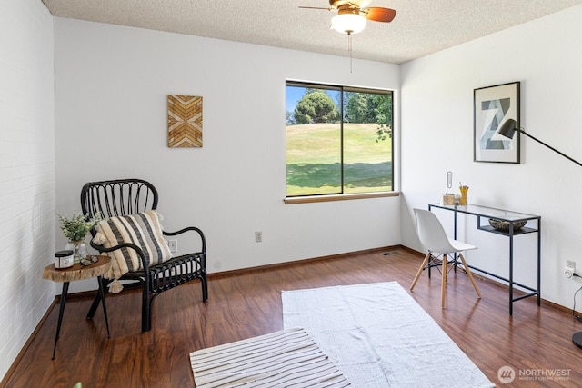 10742 Glen Acres Dr S Unit T-27, Seattle, WA 98168 - sitting room with wood finished floors, ceiling fan, and a textured ceiling