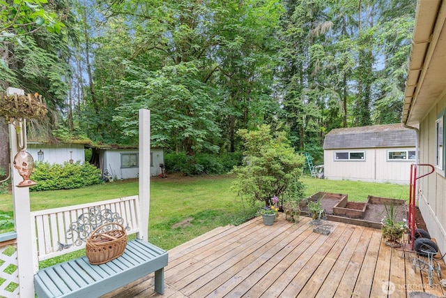 18330 Jim Creek Rd, Arlington, WA 98223 - wooden terrace featuring a lawn and a storage shed