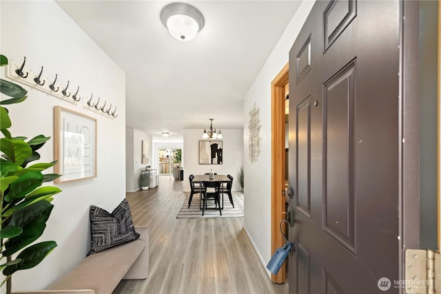 21721 SE 299th Way, Kent, WA 98042 - entryway featuring light wood finished floors and a chandelier
