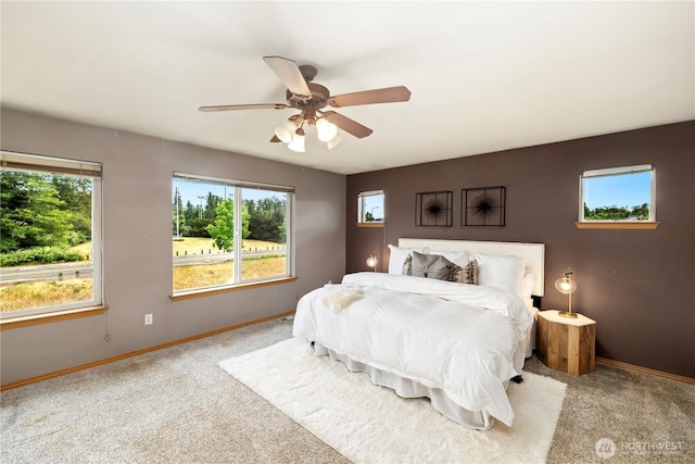 21721 SE 299th Way, Kent, WA 98042 - bedroom with multiple windows, carpet floors, and a ceiling fan