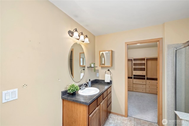 21721 SE 299th Way, Kent, WA 98042 - full bathroom featuring vanity, a stall shower, and a walk in closet