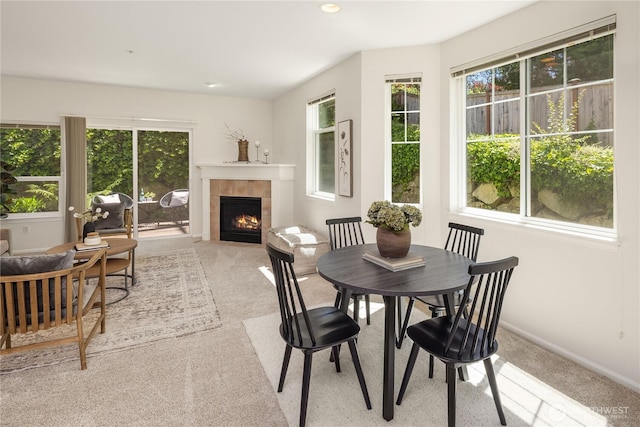 5100 Talbot Pl S Unit F, Renton, WA 98055 - dining area with light carpet, plenty of natural light, a tile fireplace, and recessed lighting