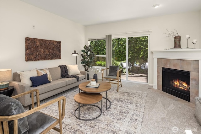 5100 Talbot Pl S Unit F, Renton, WA 98055 - living area with a tiled fireplace and carpet flooring
