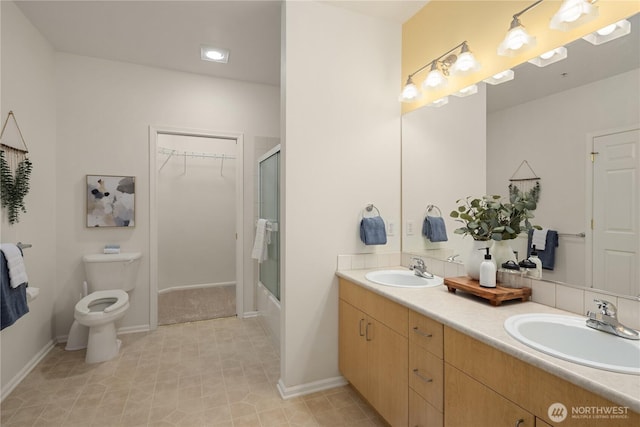 5100 Talbot Pl S Unit F, Renton, WA 98055 - bathroom featuring toilet and double vanity