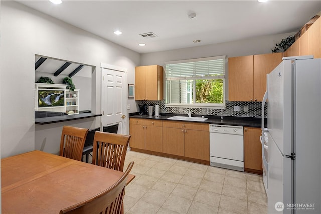 5100 Talbot Pl S Unit F, Renton, WA 98055 - kitchen featuring white appliances, decorative backsplash, dark countertops, and recessed lighting