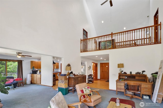 8120 Gordon Rd, Concrete, WA 98237 - living room featuring a ceiling fan, a towering ceiling, light carpet, and recessed lighting