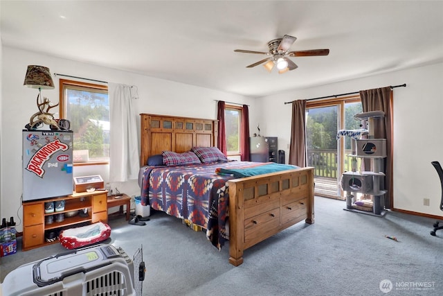8120 Gordon Rd, Concrete, WA 98237 - bedroom featuring access to exterior, carpet floors, and a ceiling fan