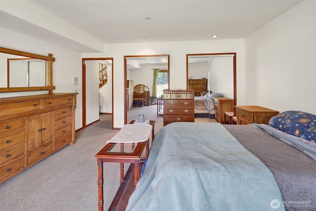 8120 Gordon Rd, Concrete, WA 98237 - bedroom featuring light carpet and two closets