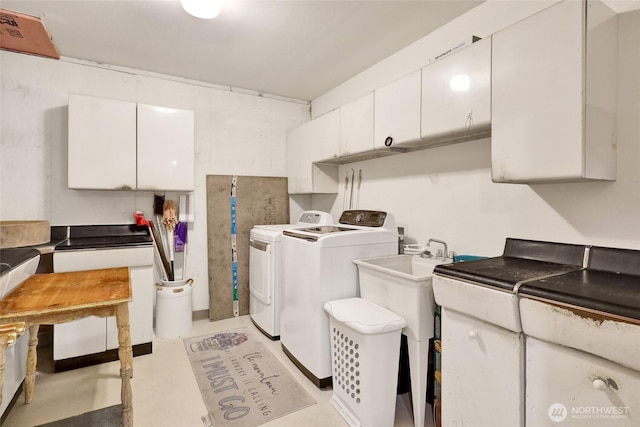 8120 Gordon Rd, Concrete, WA 98237 - washroom featuring cabinet space and separate washer and dryer