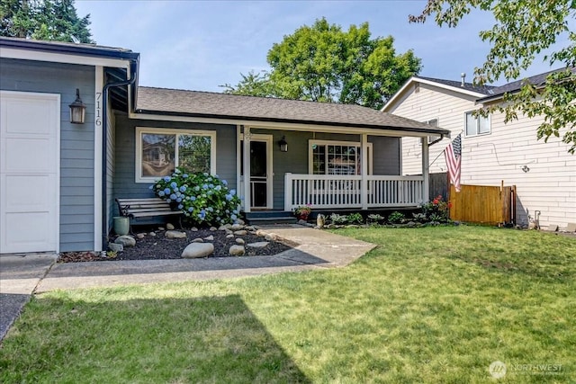 7116 200th Street Ct E, Spanaway, WA 98387 - view of front of home featuring a porch and a garage