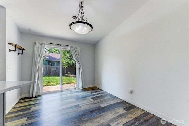7116 200th Street Ct E, Spanaway, WA 98387 - empty room featuring wood finished floors and baseboards