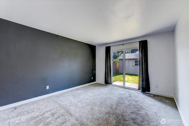 7116 200th Street Ct E, Spanaway, WA 98387 - carpeted empty room featuring baseboards