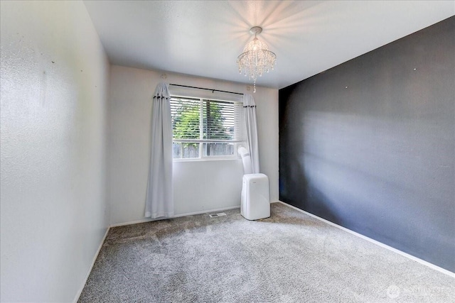 7116 200th Street Ct E, Spanaway, WA 98387 - carpeted empty room featuring a chandelier and baseboards