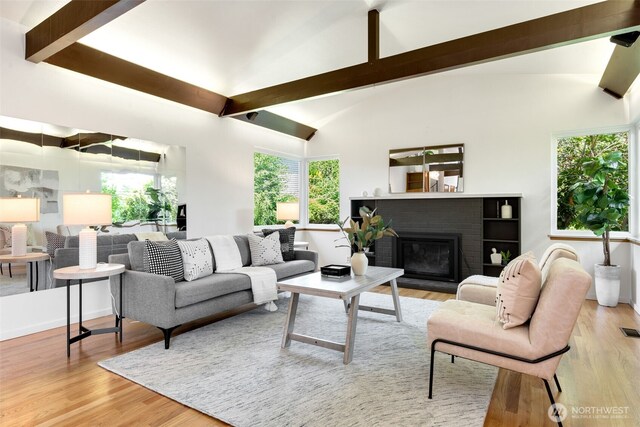 6151 S 125th St, Seattle, WA 98178 - living area with wood finished floors and a brick fireplace