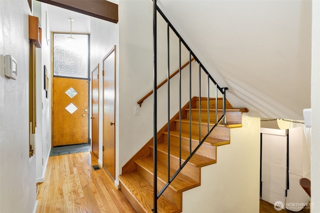 6151 S 125th St, Seattle, WA 98178 - staircase featuring wood finished floors