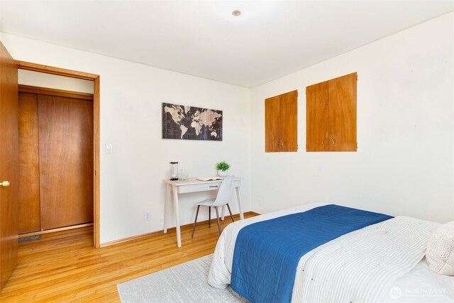 6151 S 125th St, Seattle, WA 98178 - bedroom with light wood-style flooring and baseboards