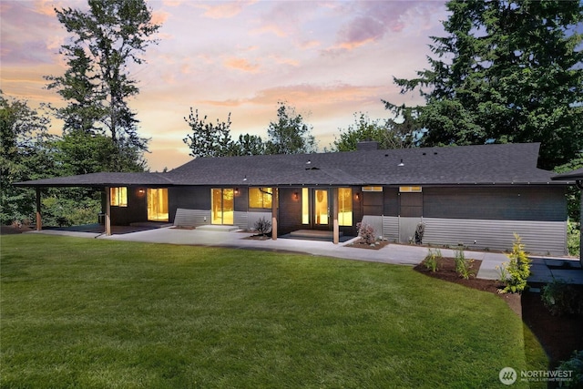 3327 170th Ave E, Lake Tapps, WA 98391 - rear view of house featuring a yard, a patio area, and roof with shingles