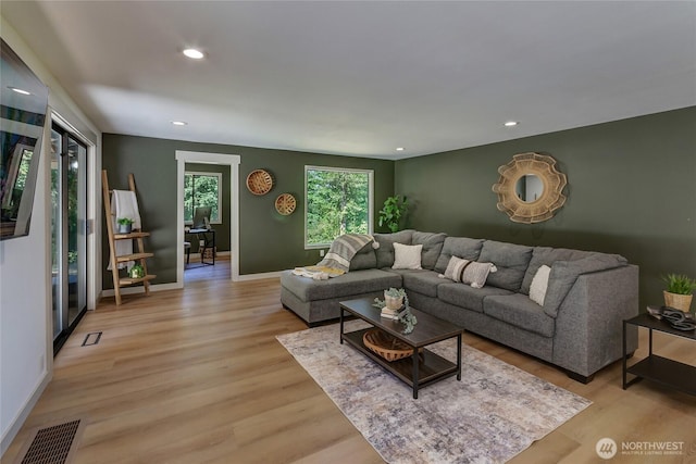 3327 170th Ave E, Lake Tapps, WA 98391 - living area featuring light wood-type flooring, recessed lighting, and baseboards