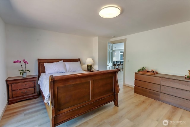 3327 170th Ave E, Lake Tapps, WA 98391 - bedroom featuring light wood finished floors and baseboards
