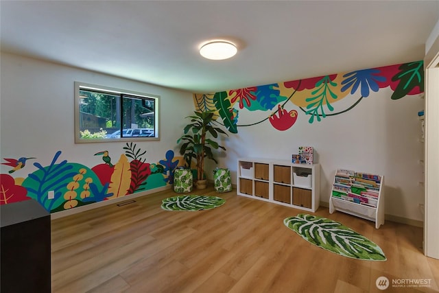 3327 170th Ave E, Lake Tapps, WA 98391 - recreation room with wood finished floors and baseboards