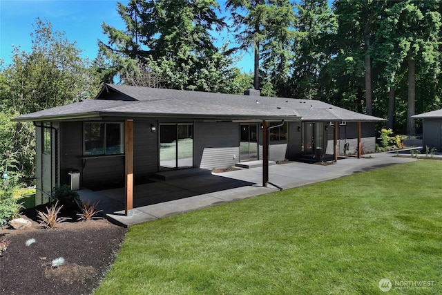 3327 170th Ave E, Lake Tapps, WA 98391 - back of house featuring a yard, a patio area, and roof with shingles