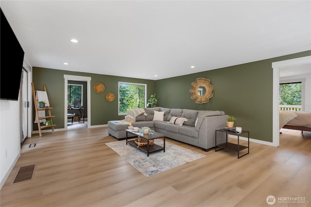 3327 170th Ave E, Lake Tapps, WA 98391 - living room with plenty of natural light, light wood-style flooring, and recessed lighting