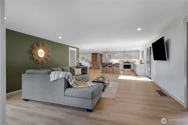3327 170th Ave E, Lake Tapps, WA 98391 - living room with light wood-type flooring and recessed lighting