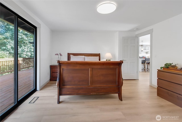 3327 170th Ave E, Lake Tapps, WA 98391 - bedroom featuring light wood-style flooring and access to outside