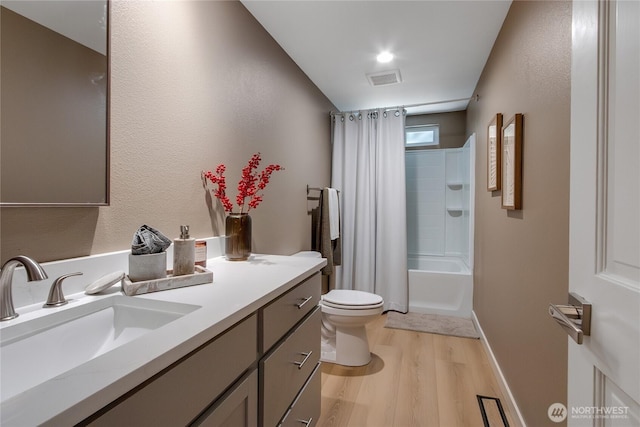 3327 170th Ave E, Lake Tapps, WA 98391 - full bathroom featuring vanity, wood finished floors, and shower / tub combo with curtain