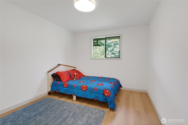 3327 170th Ave E, Lake Tapps, WA 98391 - bedroom with baseboards and wood finished floors