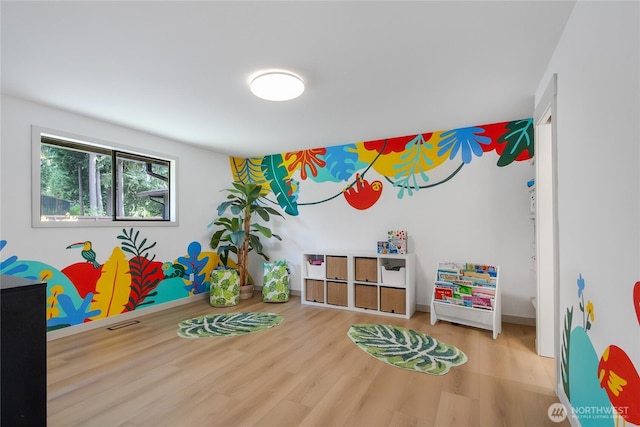3327 170th Ave E, Lake Tapps, WA 98391 - rec room featuring wood finished floors and baseboards