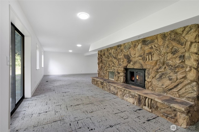 3327 170th Ave E, Lake Tapps, WA 98391 - unfurnished living room with a stone fireplace and recessed lighting