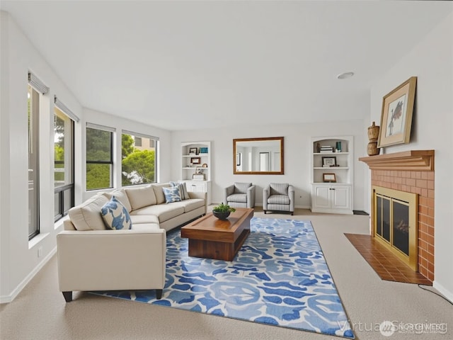 1113 5th Ave S Unit 107, Edmonds, WA 98020 - living area with built in features, a fireplace, and carpet floors