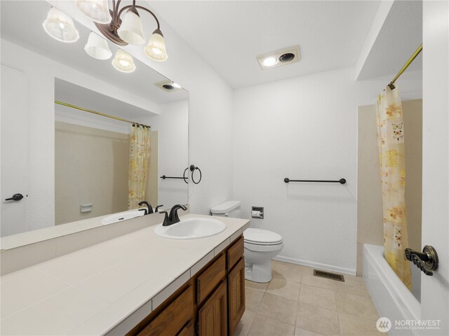 1113 5th Ave S Unit 107, Edmonds, WA 98020 - full bath with vanity, tile patterned floors, and shower / bath combo