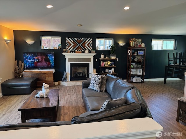 1517 Chilton Rd, Aberdeen, WA 98520 - living area featuring a glass covered fireplace and wood finished floors