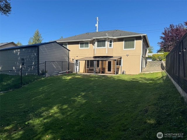 1517 Chilton Rd, Aberdeen, WA 98520 - rear view of property with a fenced backyard and a patio