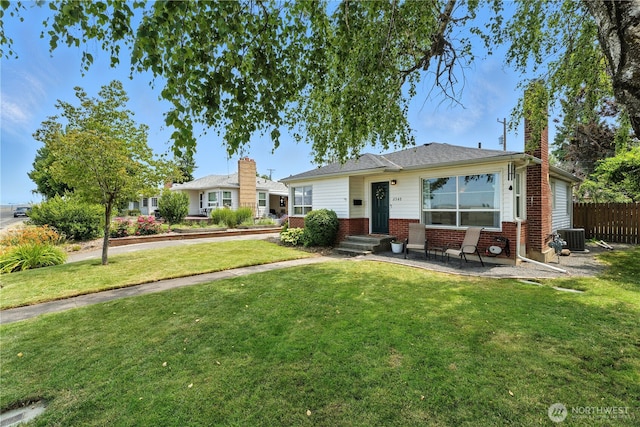 2348 Rainier St, Walla Walla, WA 99362 - view of front of property with brick siding and a chimney